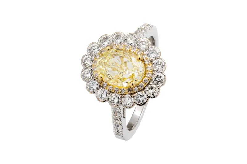 18ct White gold Fancy Light Oval Yellow Diamond Ring 2.78ct IGI Certified