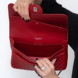 Chanel Red Jumbo Classic Double Flap Bag In Chevron Caviar Leather